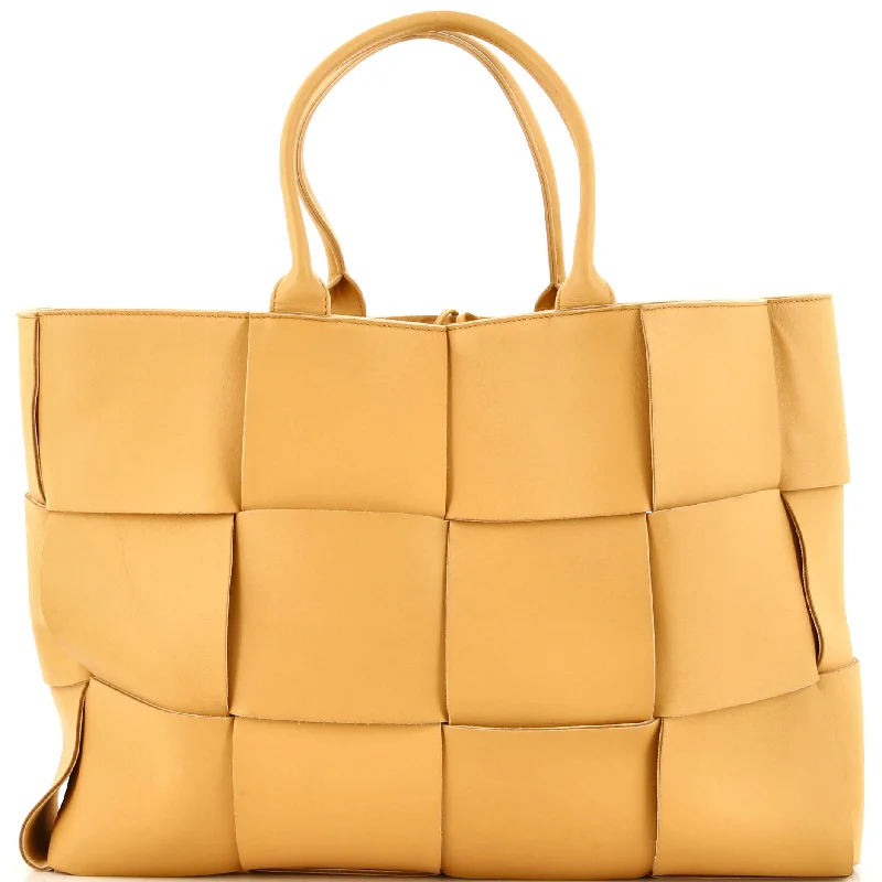 Quilted Tote Bag in Cream with Silver Hardware for a Classic and Sophisticated StyleArco Tote Maxi Intrecciato Leather Large Quilted Tote Bag in Cream with Silver Hardware for a Classic and Sophisticated StyleArco Tote Maxi Intrecciato Leather Large