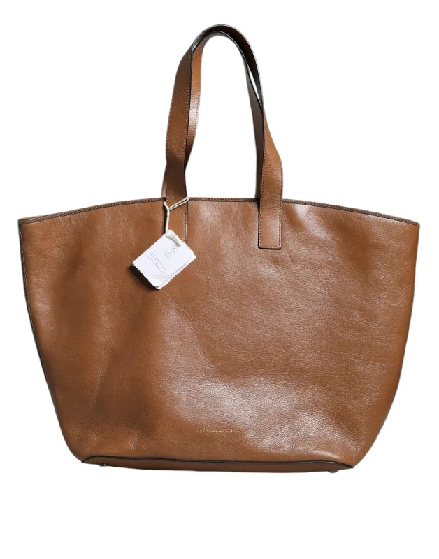 Quilted Tote Bag in Cream with Silver Hardware for a Classic and Sophisticated StyleLinen Tote Bag in Natural Beige with Braided Details for a Rustic Summer EnsembleBrunello Cucinelli  Leather Logo Shoulder Strap Shopping Tote Women's Bag