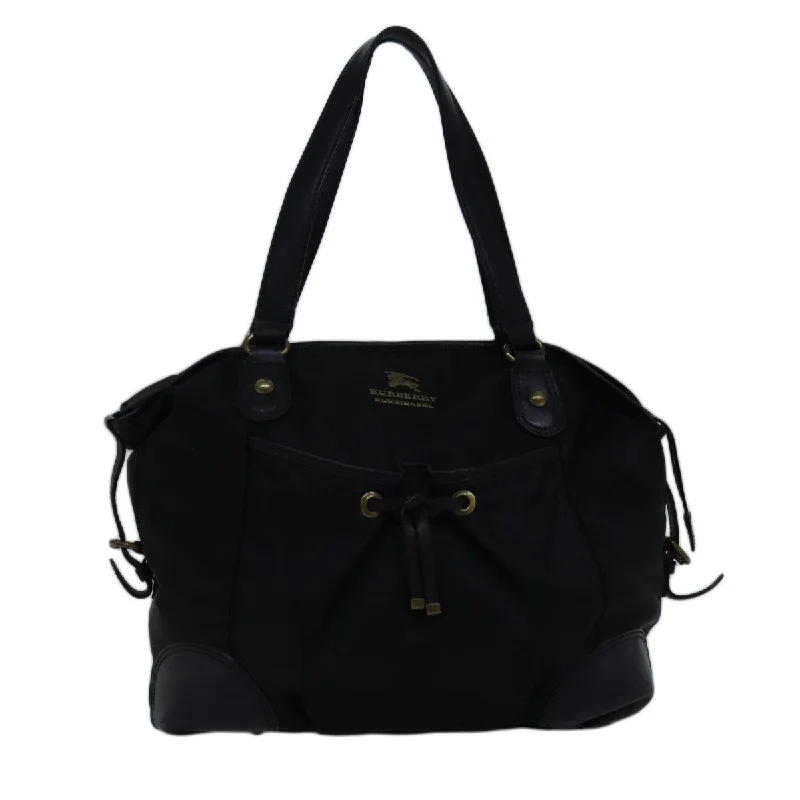Medium - Sized Canvas Tote Bag in Navy Blue with Striped Pattern for a Nautical - Inspired LookWaterproof Tote Bag in Yellow for Outdoor Activities in Wet WeatherBurberry blue Label  Synthetic Tote Bag (Pre-Owned)