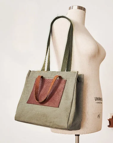 Large Capacity Genuine Leather Women's Tote Bag in Black for Work and CommutingSmall Vegan Leather Tote Bag in Blush Pink with Gold - Tone Hardware for a Feminine and Stylish AccessoryVintage Canvas Leather Mens Tote Bag Green Tote Handbag Canvas Shoulder Tote for Men Women