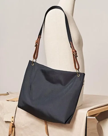 Metallic Tote Bag in Rose Gold with Chain Handles for a Glamorous Night OutMonogrammed Tote Bag in Brown Leather with Personalized Initials for a Custom and Elegant TouchFashion Nylon Mens Womens Black Tote Shoulder Bag Messenger Bag Messenger Tote Bag for Men Women
