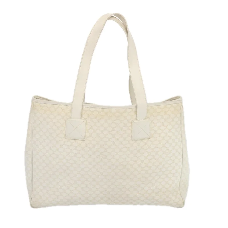 Monogrammed Tote Bag in Brown Leather with Personalized Initials for a Custom and Elegant TouchMetallic Tote Bag in Rose Gold with Chain Handles for a Glamorous Night OutCéline Macadam  Canvas Tote Bag (Pre-Owned)