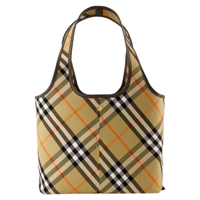 Oversized Jute Tote Bag in Natural Color with Rope Handles for a Beach VacationPatchwork Tote Bag in Denim with Vintage - Inspired Designs for a Retro AppealCheck Shopper Bag - Burberry - Cotton - Beige