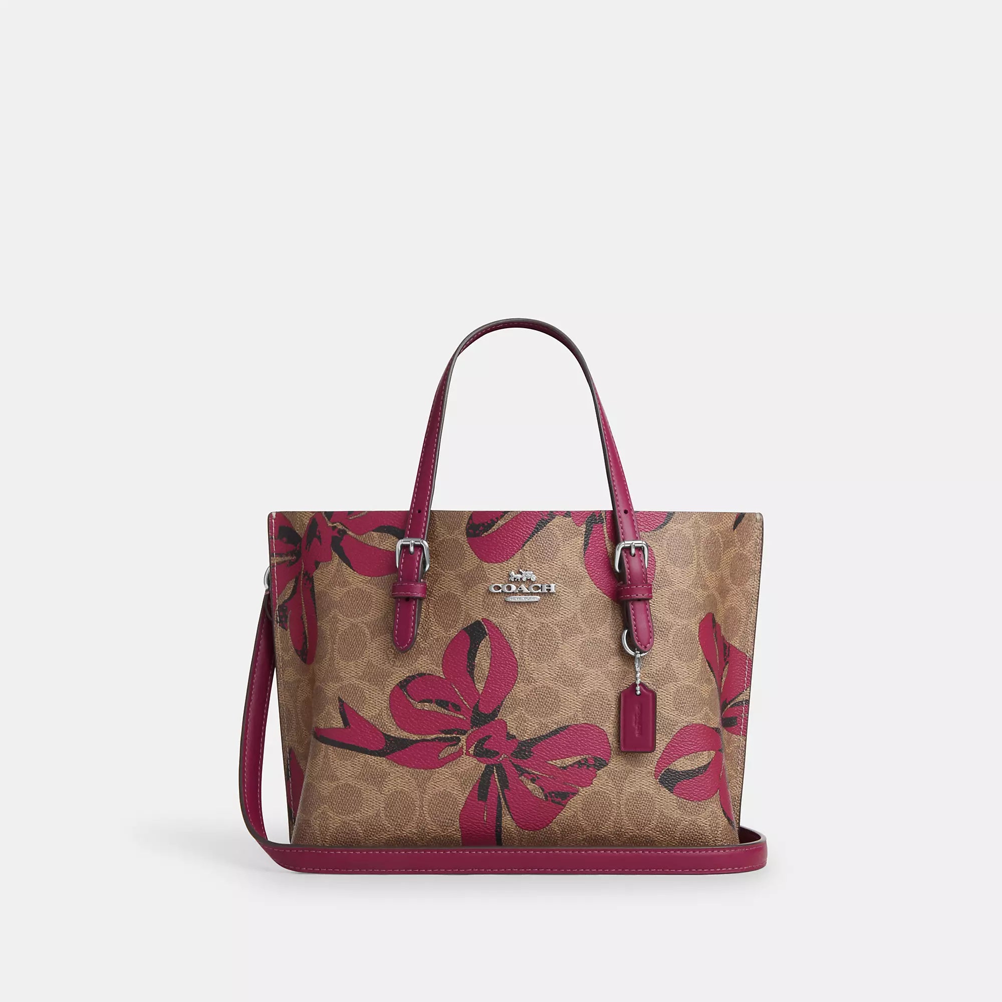 Small Vegan Leather Tote Bag in Blush Pink with Gold - Tone Hardware for a Feminine and Stylish AccessoryQuilted Tote Bag in Cream with Silver Hardware for a Classic and Sophisticated StyleCoach Outlet Mollie Tote Bag 25 In Signature Canvas With Bow Print
