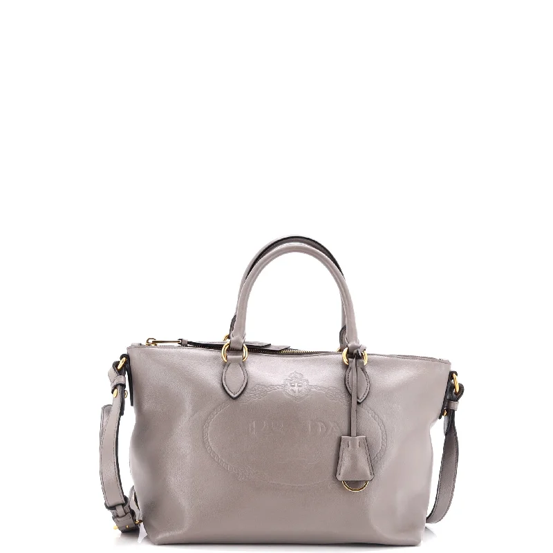 Linen Tote Bag in Natural Beige with Braided Details for a Rustic Summer EnsembleEmbossed Logo Convertible Tote Glace Calf Small