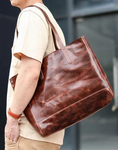 Waterproof Tote Bag in Yellow for Outdoor Activities in Wet WeatherEmbroidered Tote Bag in Beige with Floral Motifs for a Boho - Chic VibeVintage Brown Leather Men Womens Tote 15 inches Amber Brown Tote Bag Shoulder Tote Bag For Men