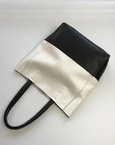 Tote Bag with RFID - Blocking Pocket in Black for Protecting Your Cards and InformationWomen's Tote Bag with Magnetic Closure in Orange for Easy Access on the GoFashion Womens White Black Leather Vertical Tote Bags White Black Shoulder Tote Bag Handbag Tote For Women