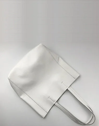 Metallic Tote Bag in Rose Gold with Chain Handles for a Glamorous Night OutTote Bag with RFID - Blocking Pocket in Black for Protecting Your Cards and InformationFashion Womens White Leather Vertical Tote Bags White Shoulder Tote Bags White Handbags Tote For Women