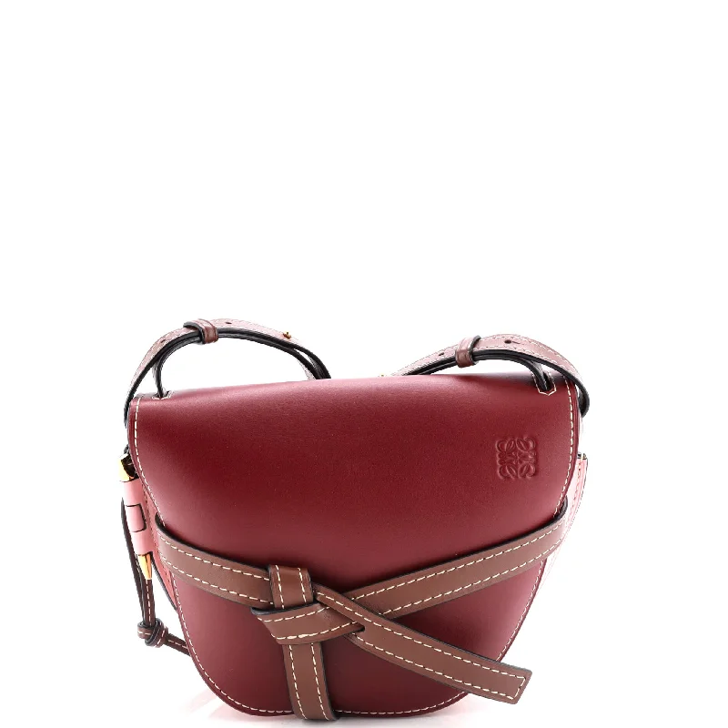 Suede Shoulder Bag in Pink with Tassel Accents for Casual OutingsGate Shoulder Bag Leather Small