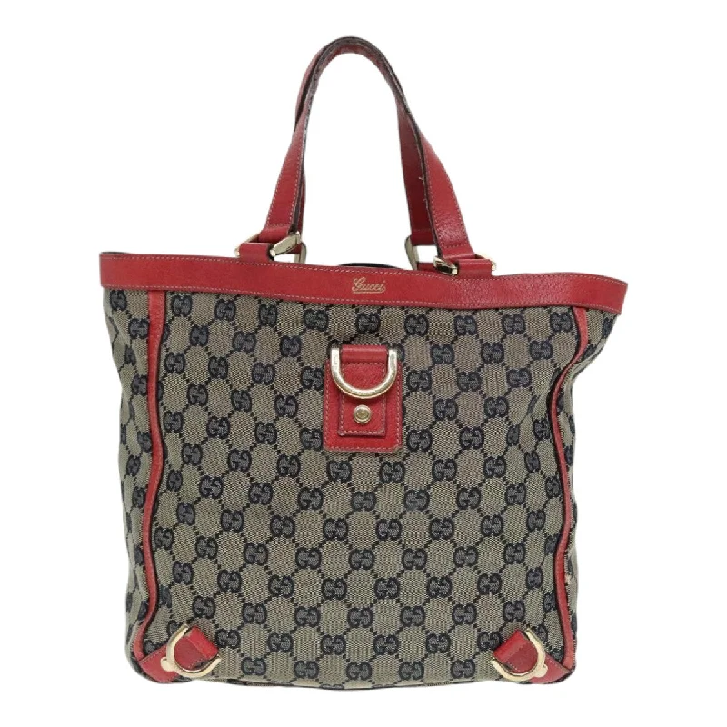 Metallic Tote Bag in Rose Gold with Chain Handles for a Glamorous Night OutFaux Fur - Trimmed Tote Bag in White for a Cozy Winter LookGucci  Canvas Tote Bag (Pre-Owned)