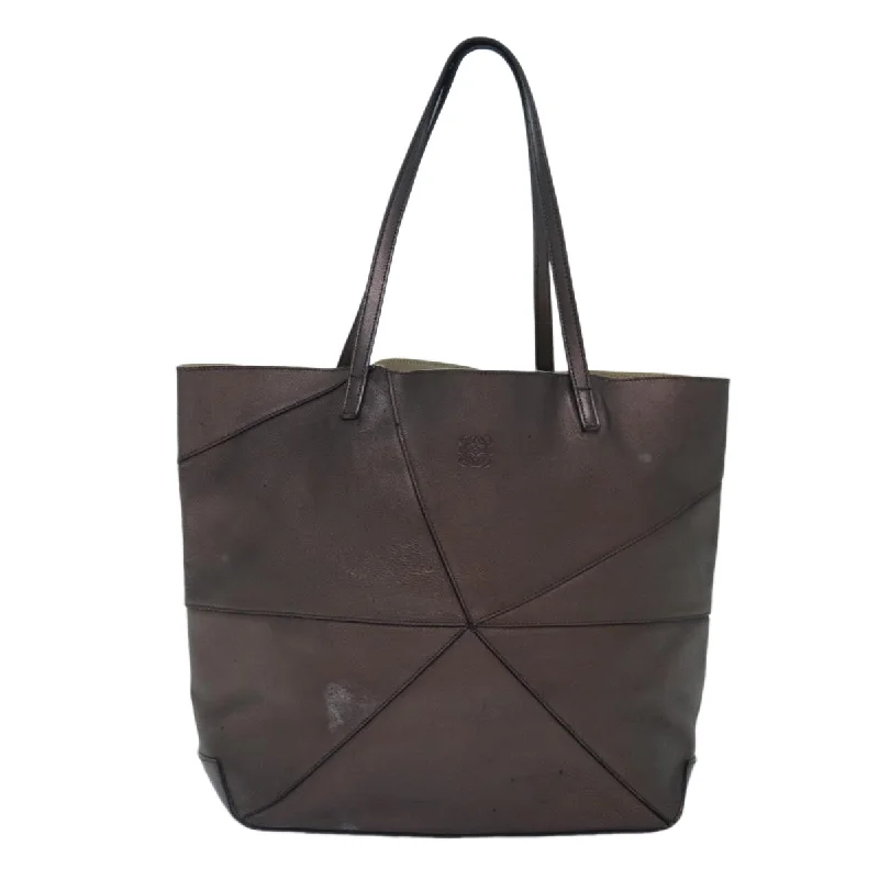 Oversized Jute Tote Bag in Natural Color with Rope Handles for a Beach VacationMonogrammed Tote Bag in Brown Leather with Personalized Initials for a Custom and Elegant TouchLoewe Origami  Leather Tote Bag (Pre-Owned)
