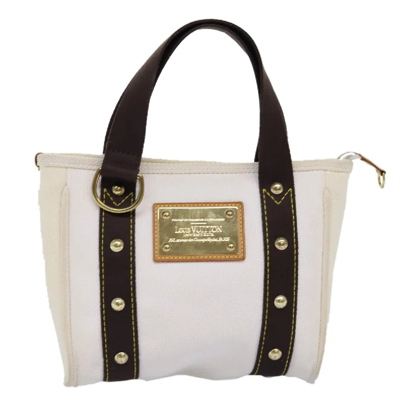 Patchwork Tote Bag in Denim with Vintage - Inspired Designs for a Retro AppealWomen's Tote Bag with Magnetic Closure in Orange for Easy Access on the GoLouis Vuitton Antigua  Canvas Tote Bag (Pre-Owned)
