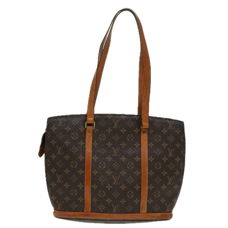 Waterproof Tote Bag in Yellow for Outdoor Activities in Wet WeatherQuilted Tote Bag in Cream with Silver Hardware for a Classic and Sophisticated StyleLouis Vuitton Babylone  Canvas Tote Bag (Pre-Owned)