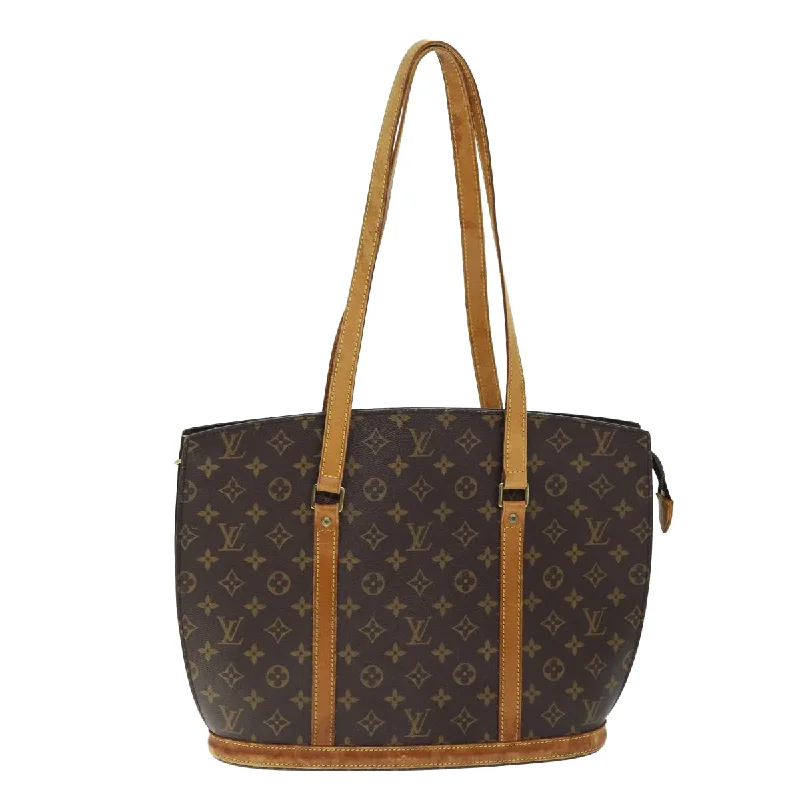 Embroidered Tote Bag in Beige with Floral Motifs for a Boho - Chic VibeGeometric - Printed Tote Bag in Multicolor for a Contemporary and Trendy OutfitLouis Vuitton Babylone  Canvas Tote Bag (Pre-Owned)