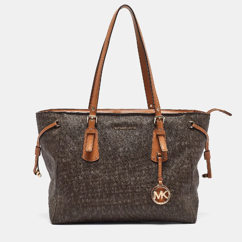 Small Vegan Leather Tote Bag in Blush Pink with Gold - Tone Hardware for a Feminine and Stylish AccessoryGeometric - Printed Tote Bag in Multicolor for a Contemporary and Trendy OutfitMichael Kors Brown Signature Coated Canvas And Leather Voyager Shopper Tote