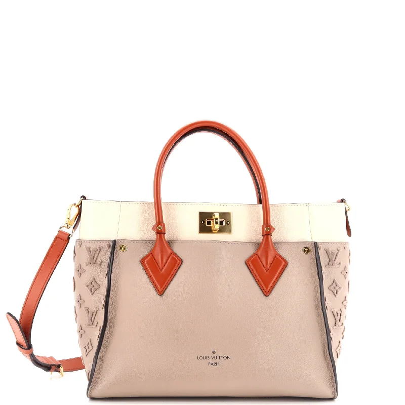 Quilted Tote Bag in Cream with Silver Hardware for a Classic and Sophisticated StyleTote Bag with Adjustable Shoulder Strap in Olive Green for Comfortable CarryingOn My Side Tote Monogram Tuffetage Leather MM Quilted Tote Bag in Cream with Silver Hardware for a Classic and Sophisticated StyleTote Bag with Adjustable Shoulder Strap in Olive Green for Comfortable CarryingOn My Side Tote Monogram Tuffetage Leather MM