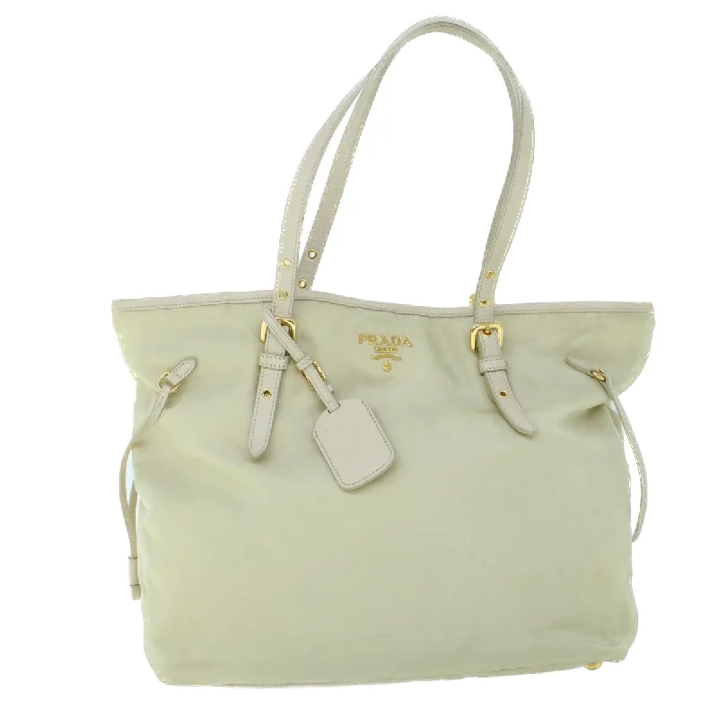 Metallic Tote Bag in Rose Gold with Chain Handles for a Glamorous Night OutPatchwork Tote Bag in Denim with Vintage - Inspired Designs for a Retro AppealPrada Re-Nylon  Synthetic Tote Bag (Pre-Owned)