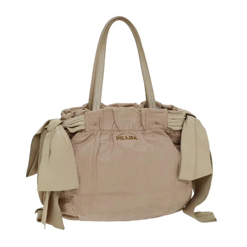 Monogrammed Tote Bag in Brown Leather with Personalized Initials for a Custom and Elegant TouchSmall Vegan Leather Tote Bag in Blush Pink with Gold - Tone Hardware for a Feminine and Stylish AccessoryPrada Ribbon  Leather Tote Bag (Pre-Owned)