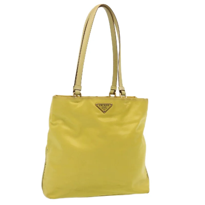 Quilted Tote Bag in Cream with Silver Hardware for a Classic and Sophisticated StyleLinen Tote Bag in Natural Beige with Braided Details for a Rustic Summer EnsemblePrada Tessuto  Synthetic Tote Bag (Pre-Owned)