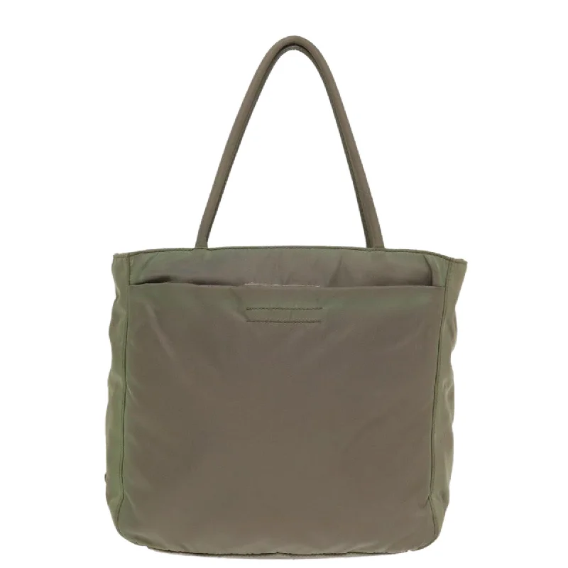 Oversized Jute Tote Bag in Natural Color with Rope Handles for a Beach VacationMonogrammed Tote Bag in Brown Leather with Personalized Initials for a Custom and Elegant TouchPrada Tessuto  Synthetic Tote Bag (Pre-Owned)