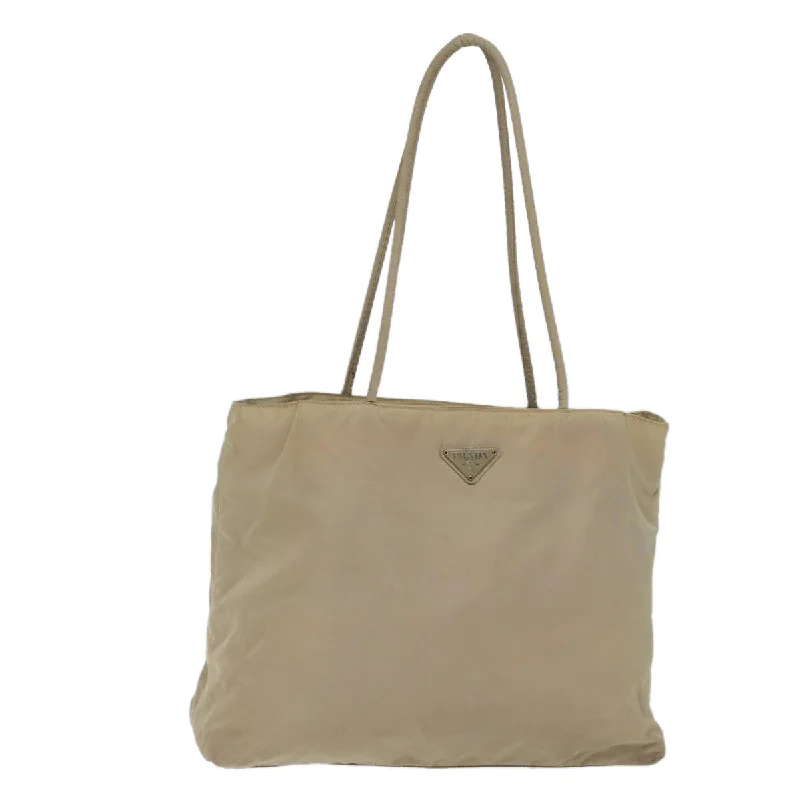 Embroidered Tote Bag in Beige with Floral Motifs for a Boho - Chic VibeWomen's Printed Tote Bag in Floral Patterns for a Spring - Themed Shopping TripPrada Tessuto  Synthetic Tote Bag (Pre-Owned)