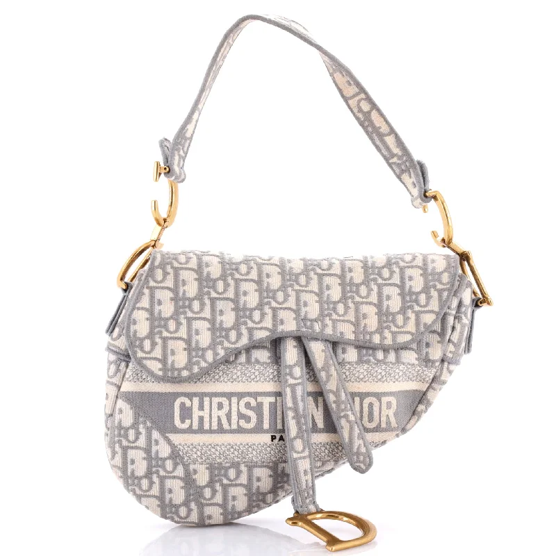 Quilted Shoulder Bag in Cream for a Classic and Elegant LookPvc Shoulder Bag in Clear with Glitter for a Fun and Modern LookSaddle Handbag Logo Embroidered Oblique Canvas Medium Quilted Shoulder Bag in Cream for a Classic and Elegant LookPvc Shoulder Bag in Clear with Glitter for a Fun and Modern LookSaddle Handbag Logo Embroidered Oblique Canvas Medium