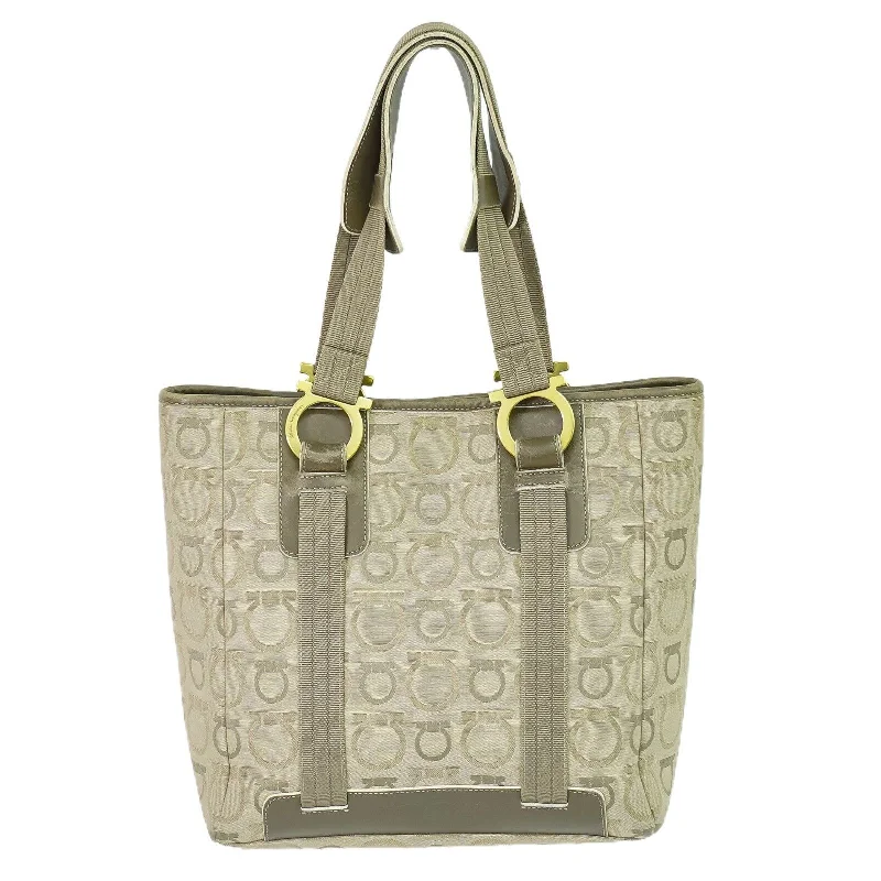 Linen Tote Bag in Natural Beige with Braided Details for a Rustic Summer EnsembleMedium - Sized Canvas Tote Bag in Navy Blue with Striped Pattern for a Nautical - Inspired LookSalvatore Ferragamo  Canvas Tote Bag (Pre-Owned)