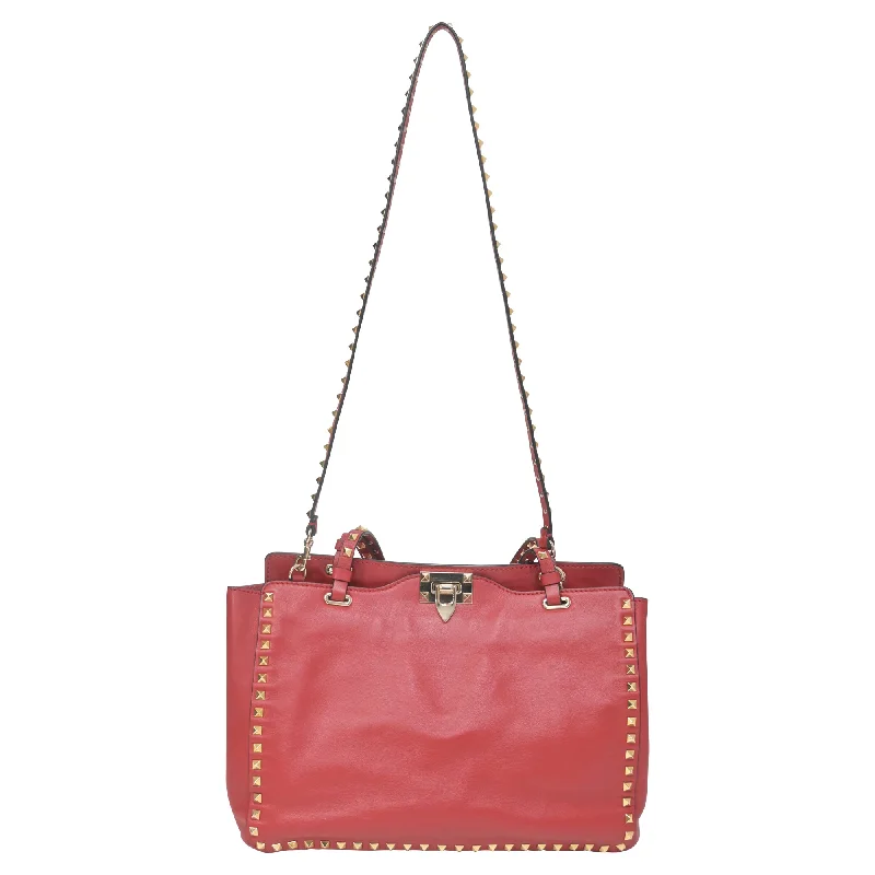 Women's Printed Tote Bag in Floral Patterns for a Spring - Themed Shopping TripValentino Rockstud Medium Tote in Red Leather