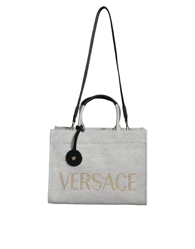 Metallic Tote Bag in Rose Gold with Chain Handles for a Glamorous Night OutMetallic Tote Bag in Rose Gold with Chain Handles for a Glamorous Night OutVersace  Top Handle Canvas Leather Logo Crossbody Tote Women's Bag