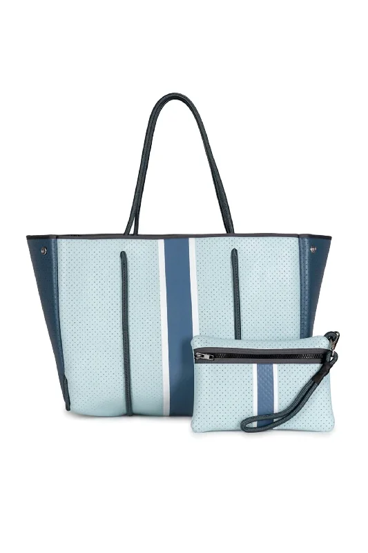 Oversized Jute Tote Bag in Natural Color with Rope Handles for a Beach VacationWomen's Tote Bag with Magnetic Closure in Orange for Easy Access on the GoWomen's Greyson Azure Tote Bag In White & Steel Blue