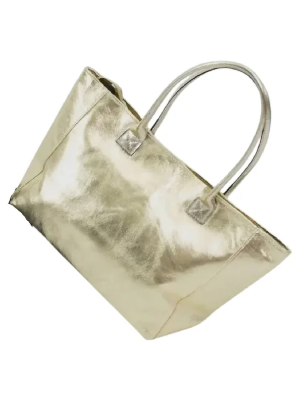 Women's Printed Tote Bag in Floral Patterns for a Spring - Themed Shopping TripLarge Capacity Genuine Leather Women's Tote Bag in Black for Work and CommutingWomen's Tote Bag In Gold
