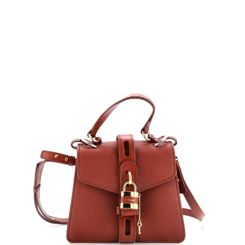 Metallic Shoulder Bag in Gold for Special OccasionsShoulder Bag with Geometric Pattern in Multicolor for a Contemporary StyleAby Day Bag Leather Small Metallic Shoulder Bag in Gold for Special OccasionsShoulder Bag with Geometric Pattern in Multicolor for a Contemporary StyleAby Day Bag Leather Small