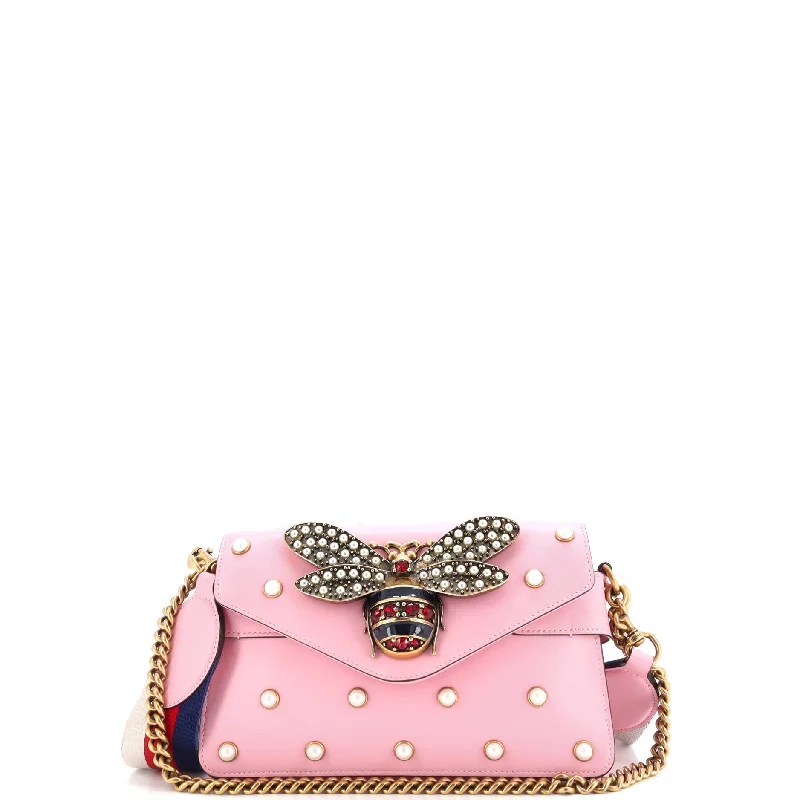 Women's Shoulder Bag with Floral Embroidery in Purple for Spring WalksEmbroidered Denim Shoulder Bag in Blue for a Vintage VibeBroadway Pearly Bee Shoulder Bag Embellished Leather Mini